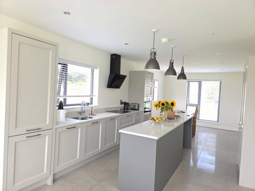 Gray hand painted kitchen cupboards in coleraine