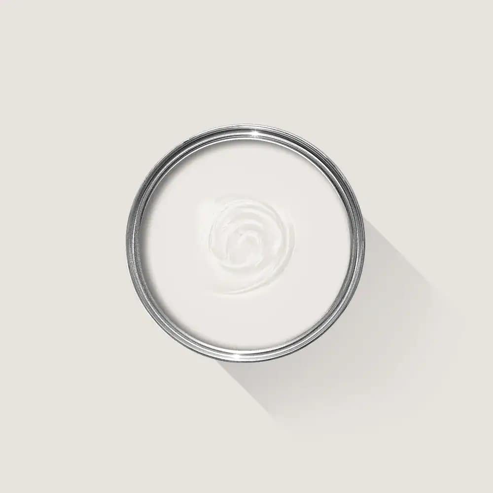 Bright white interior paint in a metal can, perfect for home renovation projects in Portstewart. Expert painters from G&E Interior Painting offer quality services for walls and ceilings.
