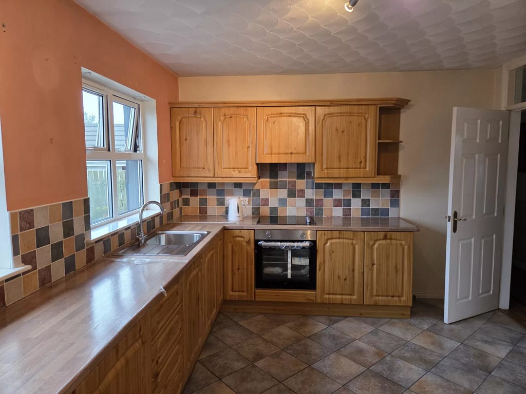 Before pitchure of dated kitchen cupboards in coleraine