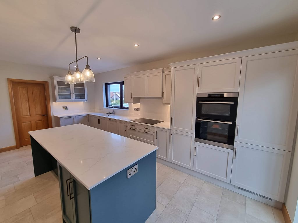 modren gray kitchen with a blue island