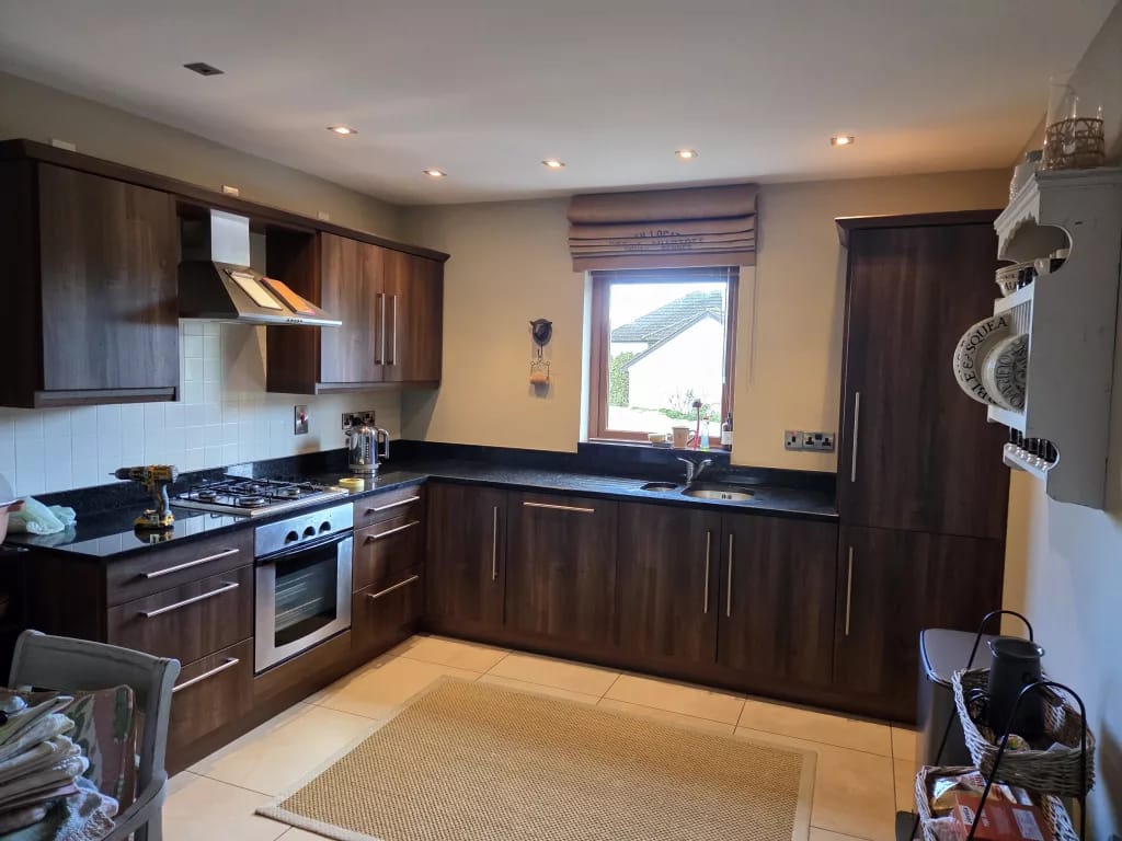 dated and dark kitchen cupboards befor painting in coleraine