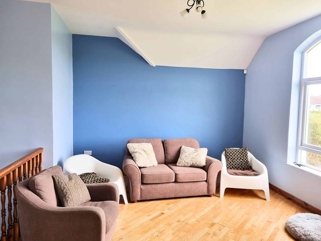 Cozy living room with blue accent wall