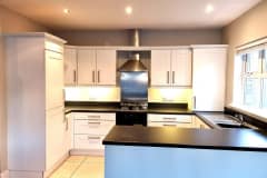 off white hand painted kitchen cupboards in coleraine